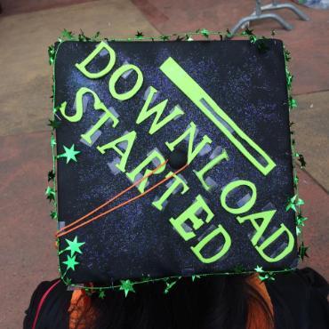 a clever CS student decorated their graduation cap with 
