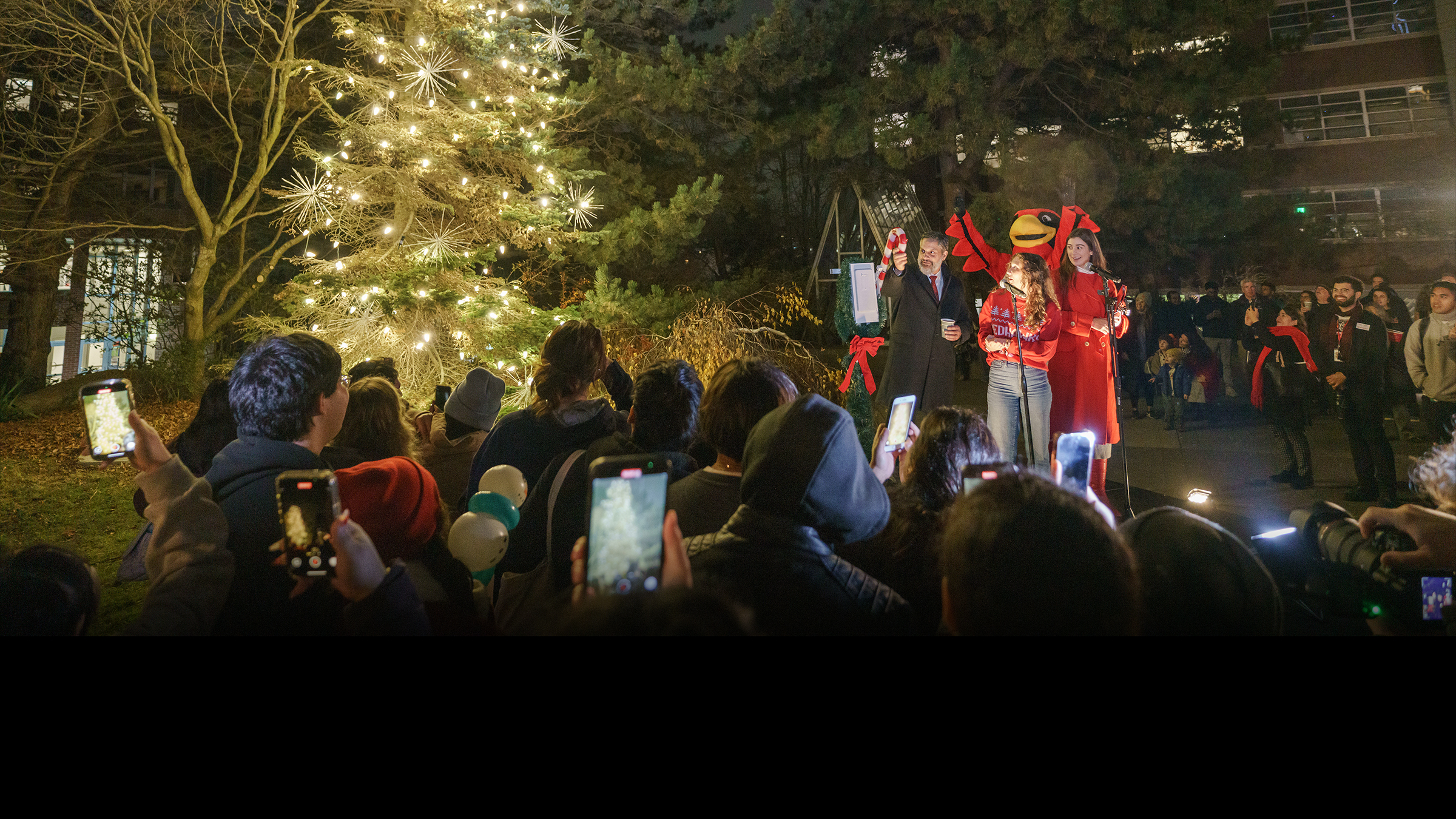 Students looking festive at the campus Christmas Tree Lighting event