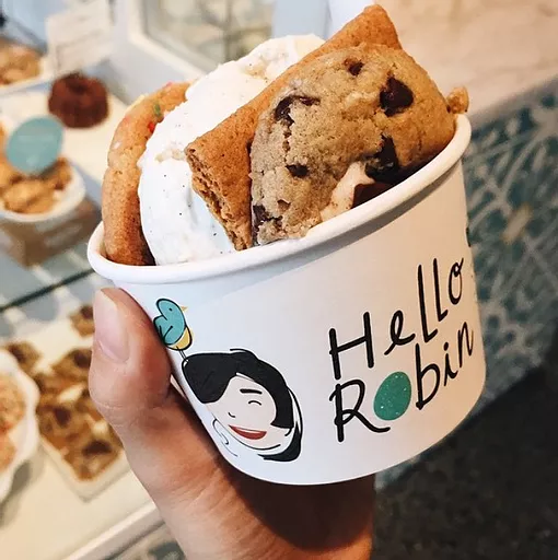 A photo of someone holding a cup of cookies from Hello Robin