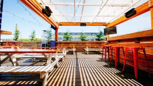 A photo of a rooftop eating space