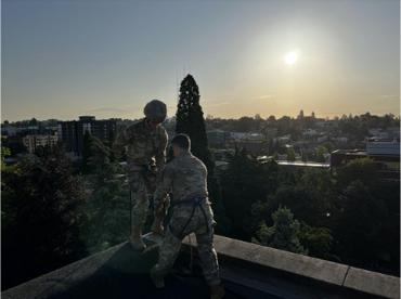 Cadets on top of Casey rappelling Building Sunrise