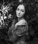 Sofia Sayabalian Headshot in black and white in a garden