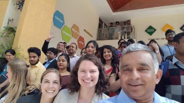 Madhu with colleagues on a visit to India