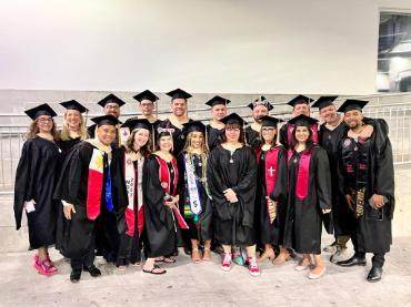 A group of graduates in caps and gowns