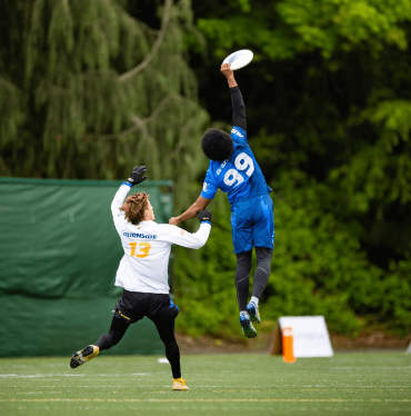 Two men playing Ultimate Frisbee