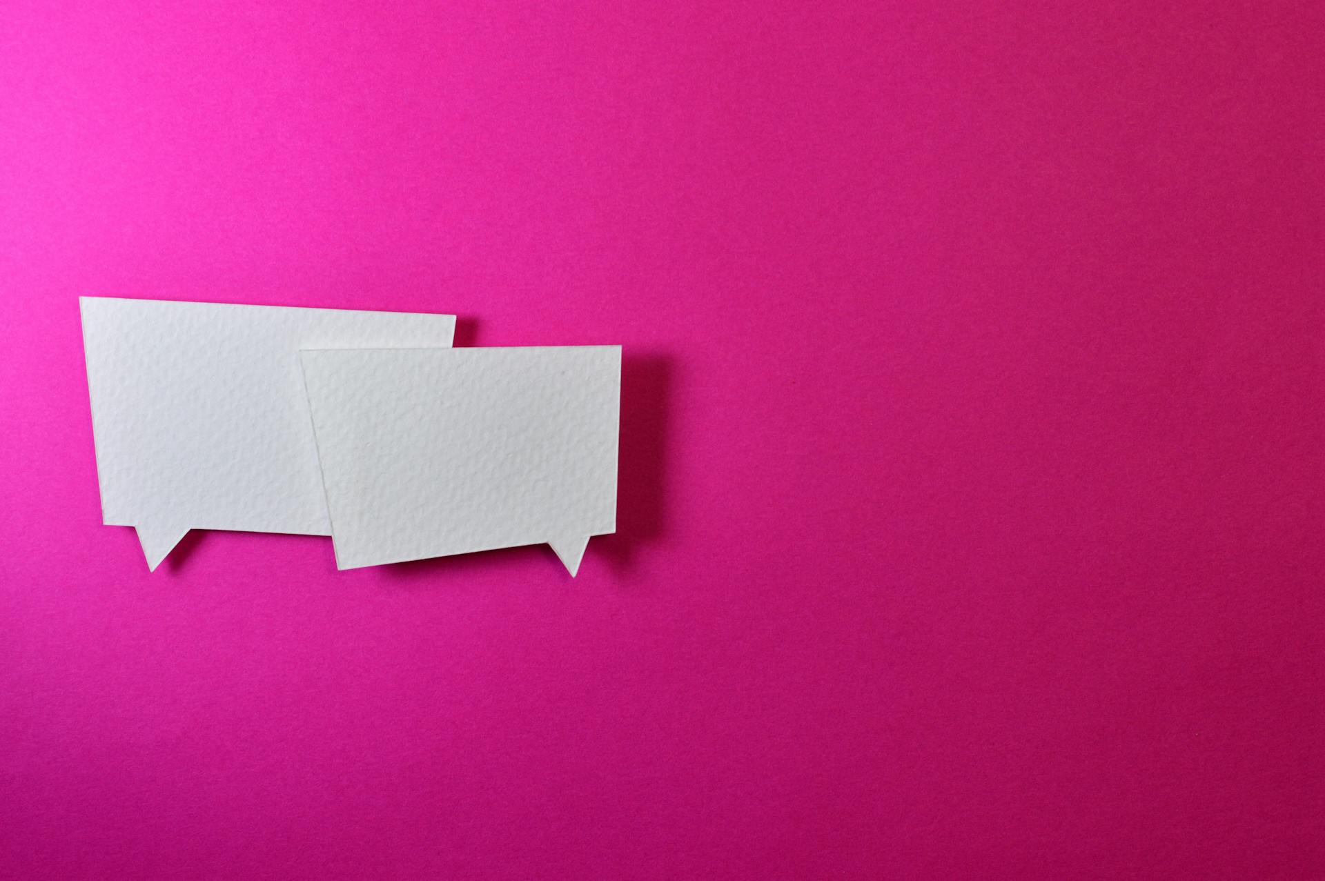 Sticky-note pads shaped like speech bubbles, with pink background