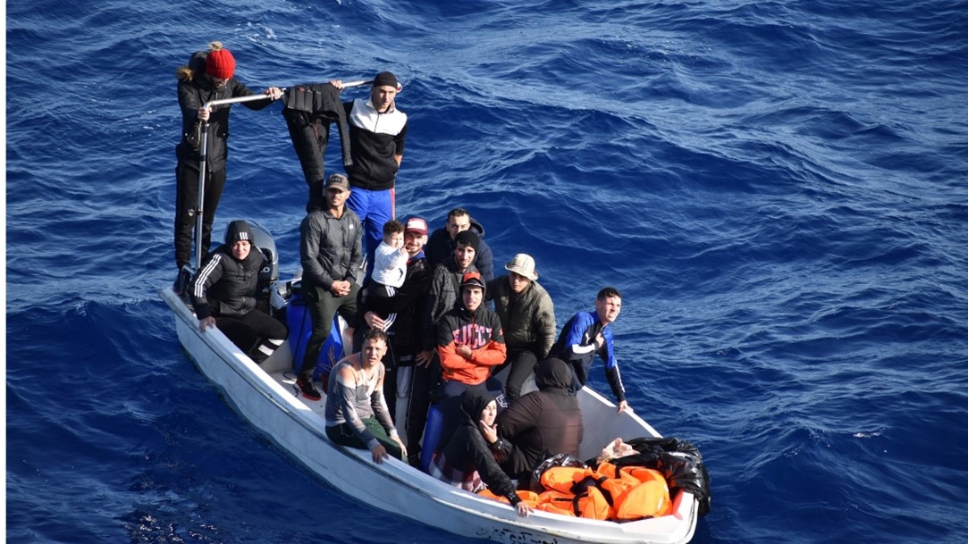 Migrants are rescued in a small boat