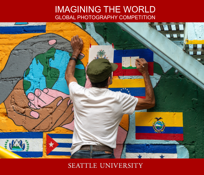 a man paints a mural